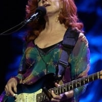 Bonnie Raitt performs to a sold-out crowd on Feb. 16, 2006, at the Dodge Theater in Phoenix  © Tom Hood /AP