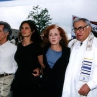 John Densmore, activist Julia "Butterfly" Hill, singer Bonnie Raitt, and Rabbi Joe Hurwitz join activists organized by the Rainforest Action Network to protest logging practices July 25, 2001 outside the Boise Cascade office products headquarters in Itasca, IL.