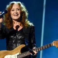 Musician Bonnie Raitt performs onstage at the 25th anniversary MusiCares 2015 Person Of The Year Gala honoring Bob Dylan at the Los Angeles Convention Center on February 6, 2015 in Los Angeles, California  © Larry Busacca/Getty Images for NARAS