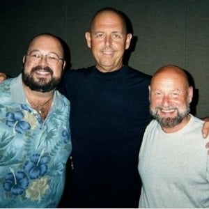 Louis Sall and Scott Curtis flank Steve Raitt. The duo shaved their heads to match Steve's chrome dome