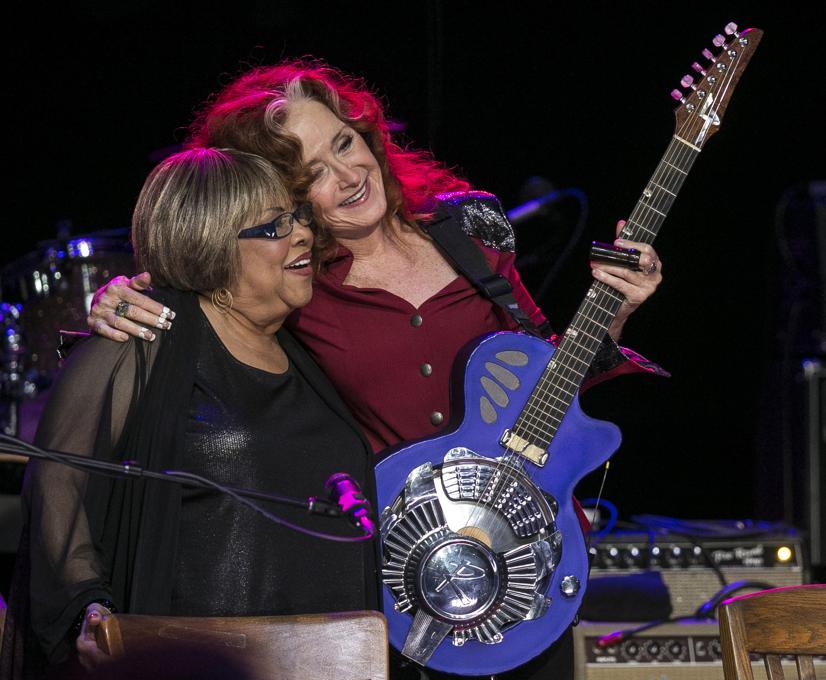 Bonnie Raitt and Mavis Staples, hug after a song during the Austin City Limits Hall of Fame Induction and Celebration held at ACL Live at the Moody Theatre, in Austin, Tx., on Wednesday, Oct. 12, 2016. Performers B.B. King, Bonnie Raitt and Kris Kristofferson, were inducted. (AUSTIN AMERICAN-STATESMAN / RODOLFO GONZALEZ)