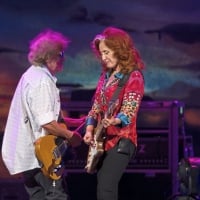 Band member George Marinelli plays alongside Bonnie Raitt as she performes before James Taylor - Saturday, July 15, 2017 at PPG Paints Arena in Uptown.  © Rebecca Droke /Post-Gazette