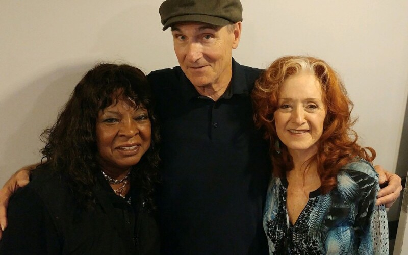 James Taylor with Bonnie Raitt and Martha Reeves, known for leading "Martha Reeves & The Vandellas." So much talent in one photo!