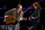 Stephen Stills of Crosby, Stills and Nash with Bonnie Raitt performs onstage at the 25th Anniversary Rock & Roll Hall of Fame Concert at Madison Square Garden on October 29, 2009 in New York City.