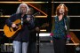 David Crosby of Crobsy, Stills and Nash with Bonnie Raitt perform onstage at the 25th Anniversary Rock & Roll Hall of Fame Concert at Madison Square Garden on October 29, 2009 in New York City.