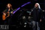 Bonnie Raitt and David Crosby of Crosby, Stills and Nash perform Love Has No Pride onstage at the 25th Anniversary Rock & Roll Hall of Fame Concert at Madison Square Garden on October 29, 2009 in New York City.