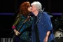 Graham Nash of Crosby, Stills and Nash with Bonnie Raitt onstage at the 25th Anniversary Rock & Roll Hall of Fame Concert at Madison Square Garden on October 29, 2009 in New York City.