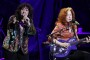 Maria Muldaur, left, performs with Bonnie Raitt during a benefit tribute show for harmonica player Norton Buffalo at the Fox Theater in Oakland, Calif. on Friday, Jan. 22, 2010. Buffalo, who was born in Oakland, appeared on more than 180 albums in his career and spent 33 years with the Steve Miller Band. 100% of the concert proceeds will go to the Buffalo family. Buffalo died from cancer on Oct. 30.