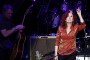 Bonnie Raitt points to the heavens as she and Steve Miller from the Steve Miller Band along with Doobie Bros performed in a tribute concert for the late Bay Area harmonic legend Norton Buffalo Saturday night Jan 23, 2010 at the Fox Theater in downtown Oakland.
