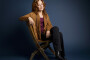 In this March 7, 2016 photo, Bonnie Raitt poses for a portrait in New York to promote her new album, Dig In Deep."